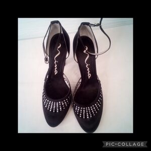 Black heels embellished with rhinestones